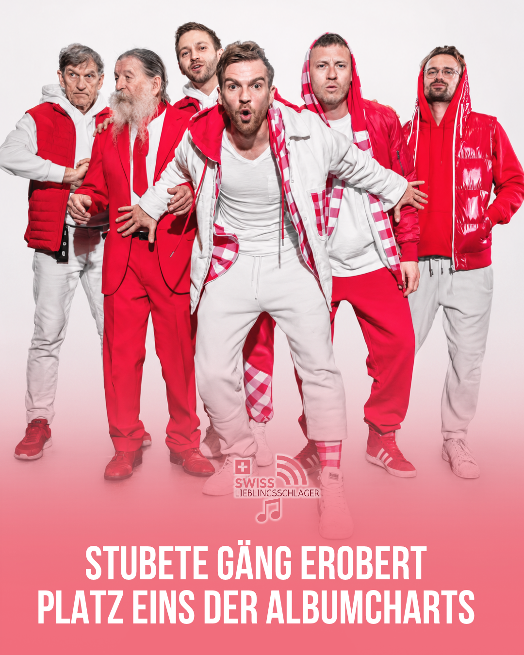 Die sechs Mitglieder der Stubete Gäng in rot-weissen Outfits mit der Nachricht zum ersten Platz ihres Albums «Hände höch!» in der Schweizer Albumhitparade.